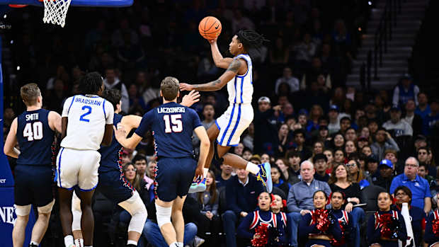 Dec 9, 2023; Philadelphia, Pennsylvania, USA; Kentucky Wildcats guard Rob Dillingham (0) shoots the ball against the Penn Quakers in the first half at Wells Fargo Center. Mandatory Credit: Kyle Ross-USA TODAY Sports
